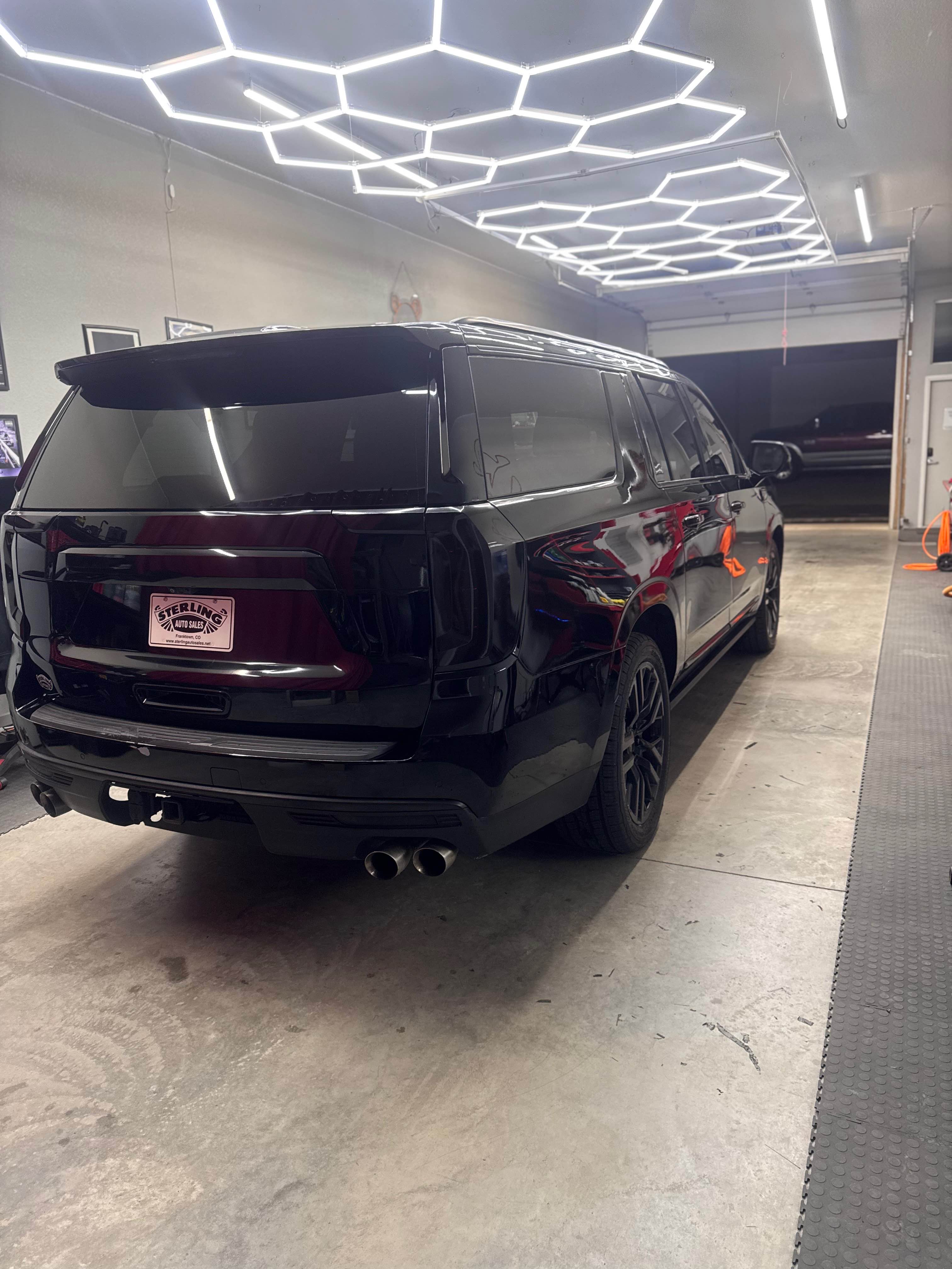 Black GMC Yukon Denali Rear