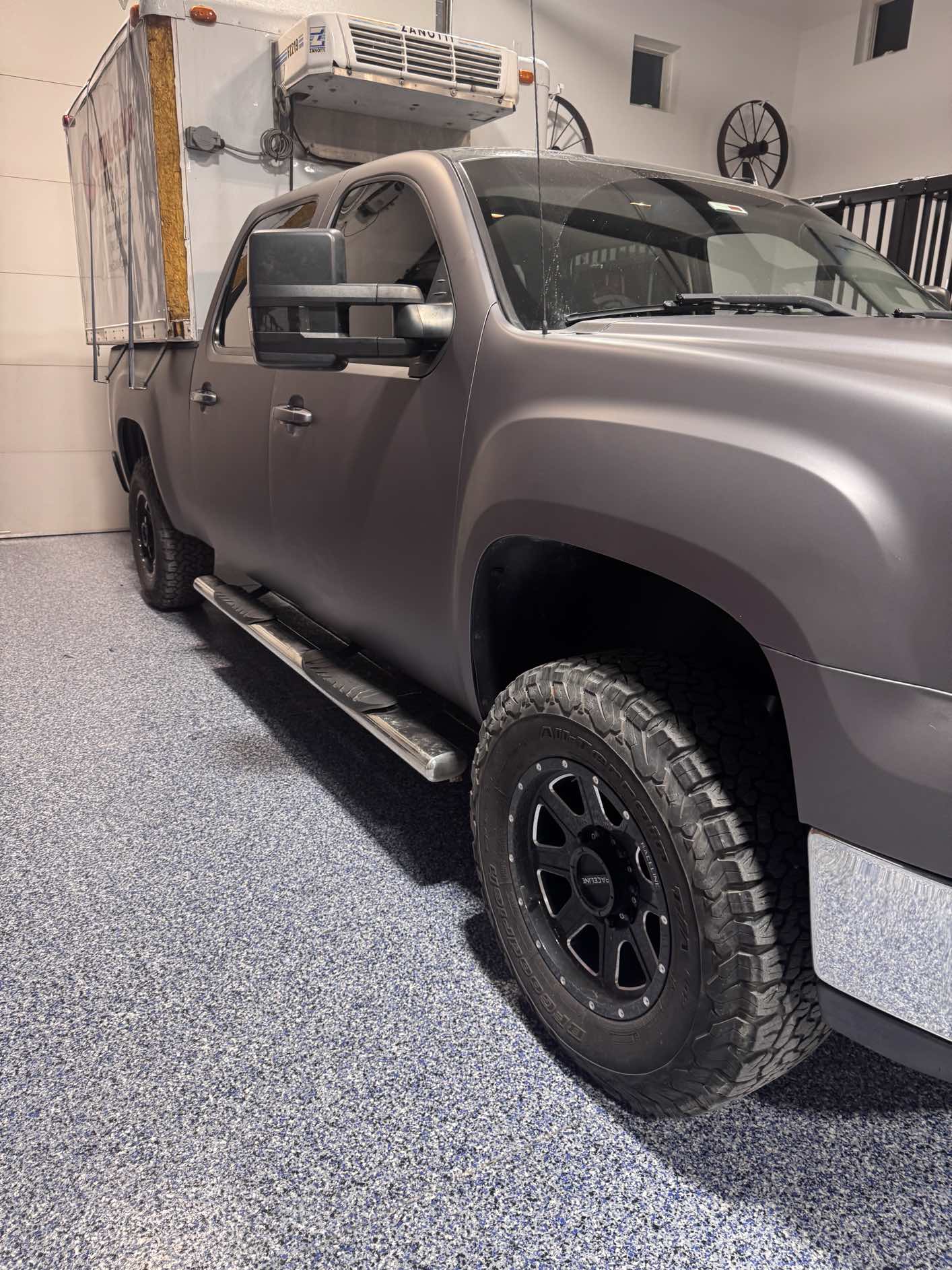 GMC Sierra with matte grey vinyl wrap - side view
