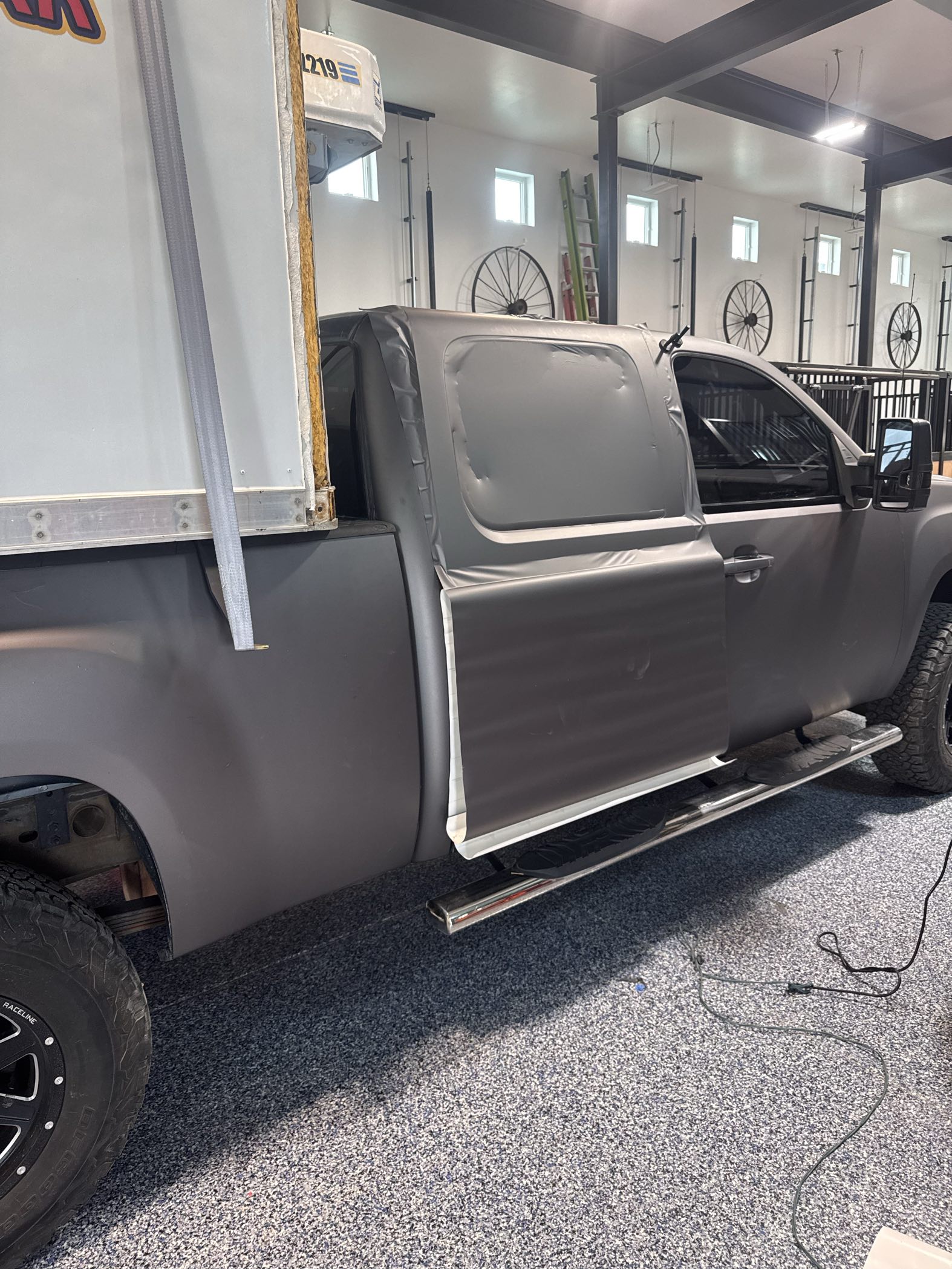GMC Sierra vinyl wrap installation in progress