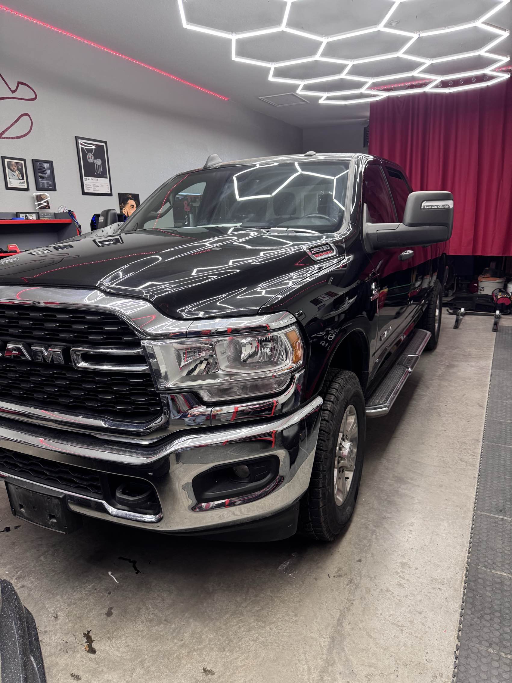 Black RAM 2500 with ceramic coating showing mirror-like reflections