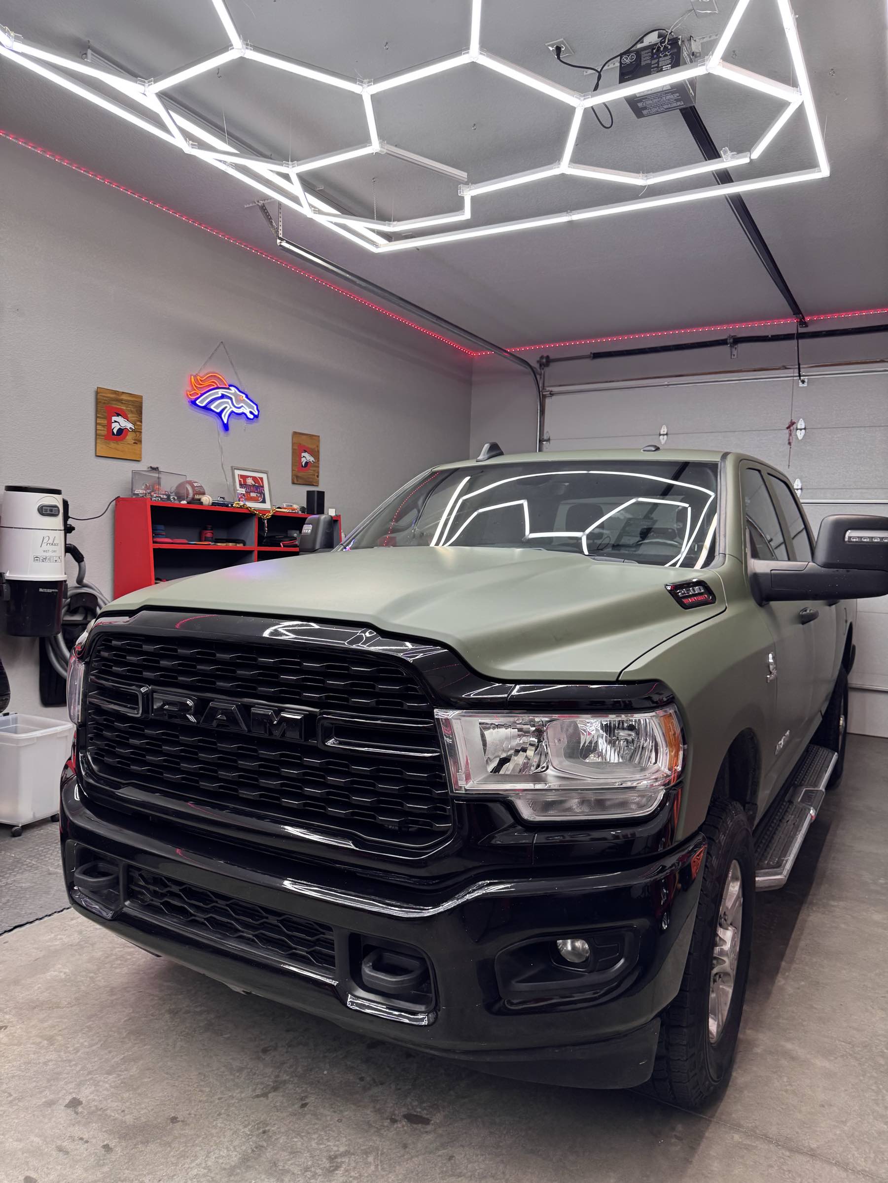 Olive green RAM Big Horn with ceramic coating under hexagon lights